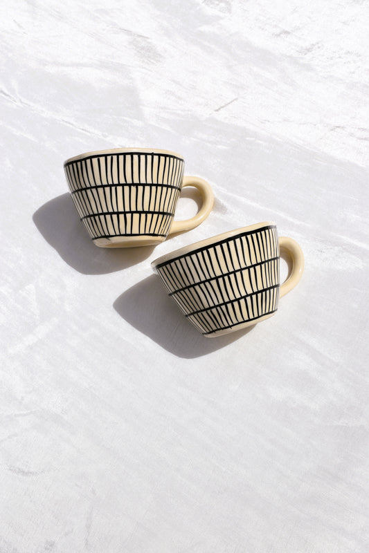Black and white striped coffee mug