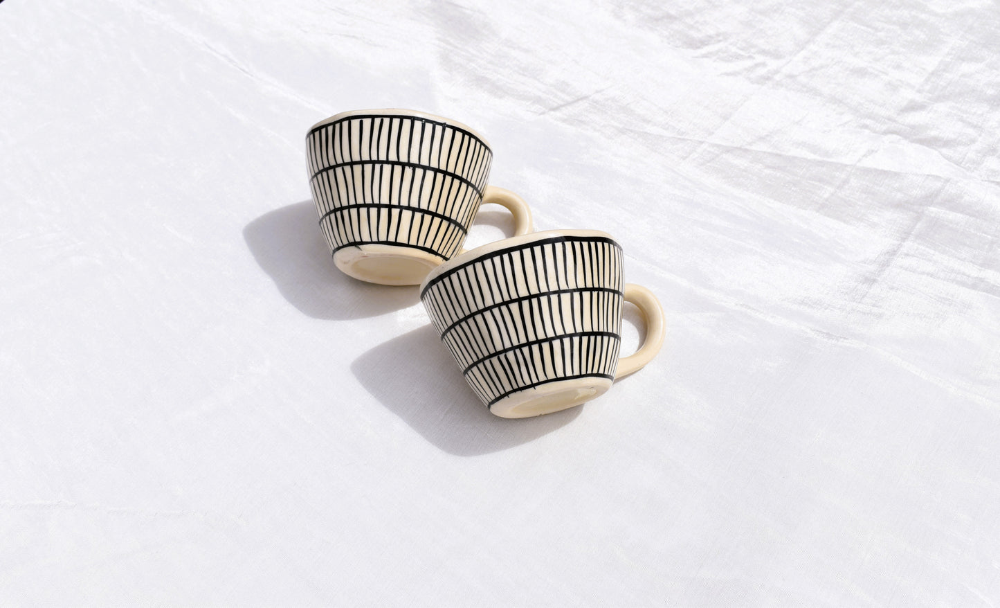 Black and white striped coffee mug