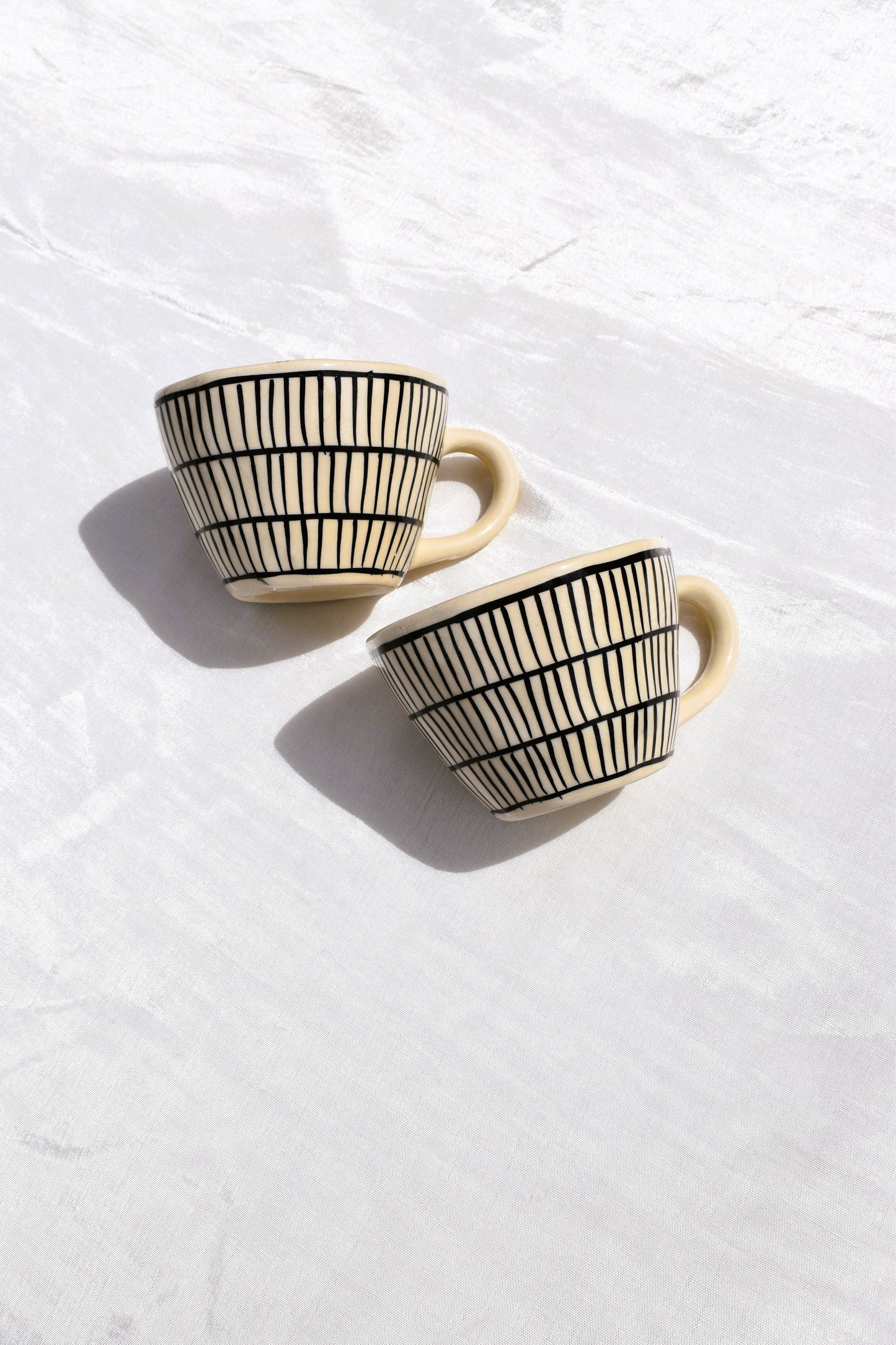 Black and white striped coffee mug
