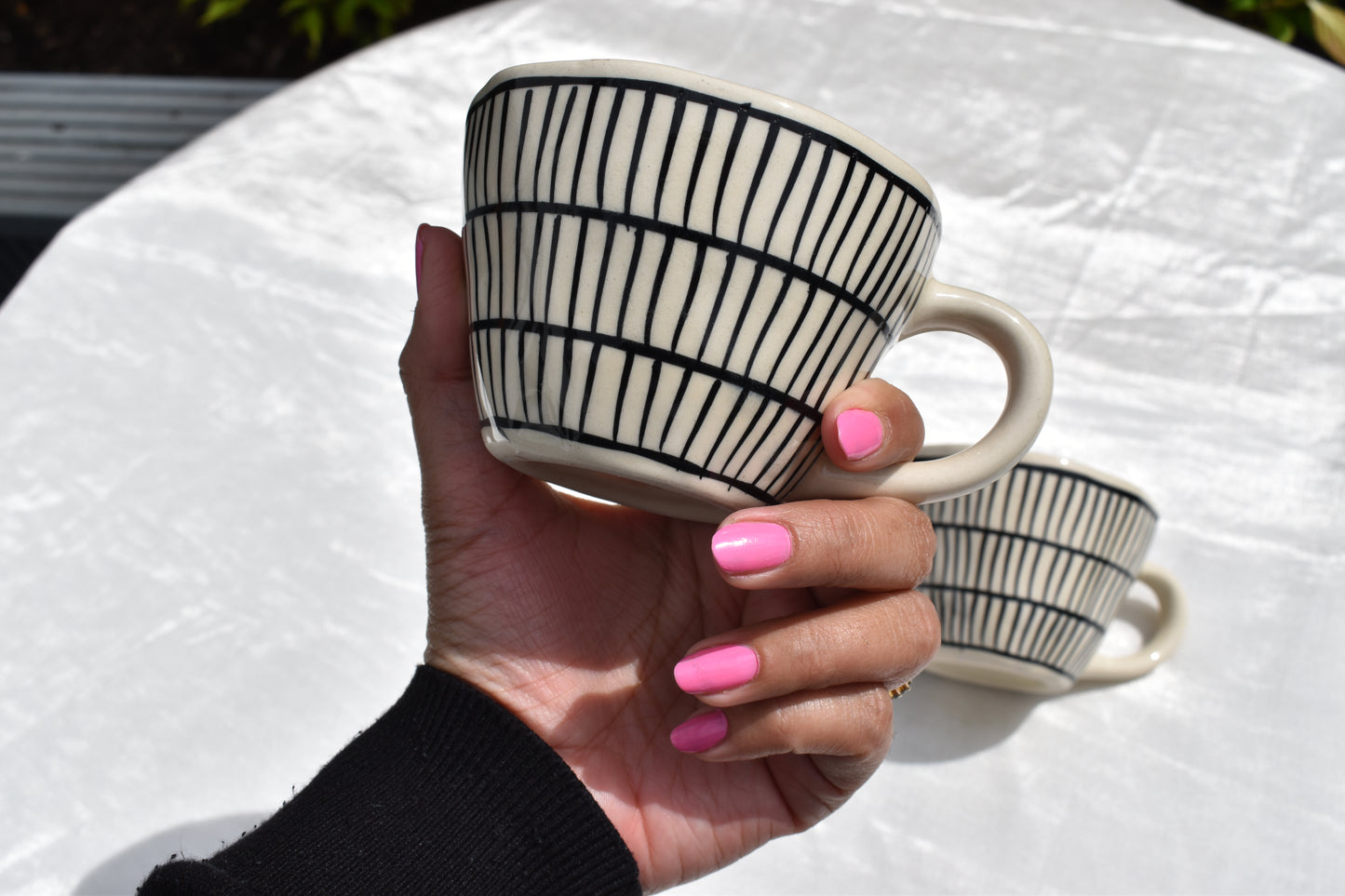 Black and white striped coffee mug