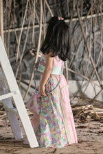 Load image into Gallery viewer, Pink and tropical print lehengas, strappy blouse, potli bag set
