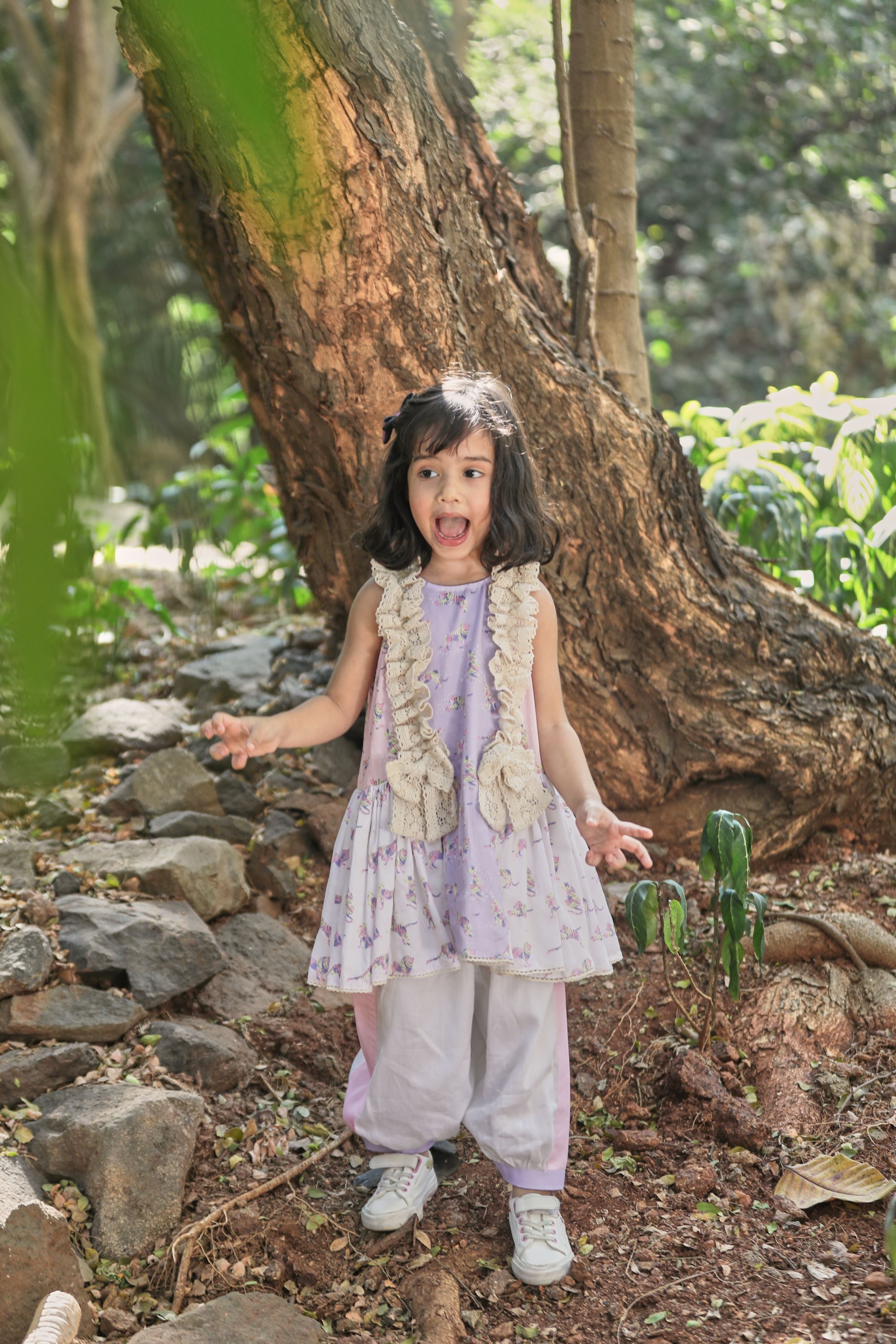 Off-white, pink, lavender animal print A-line kurta with frills & salwar set