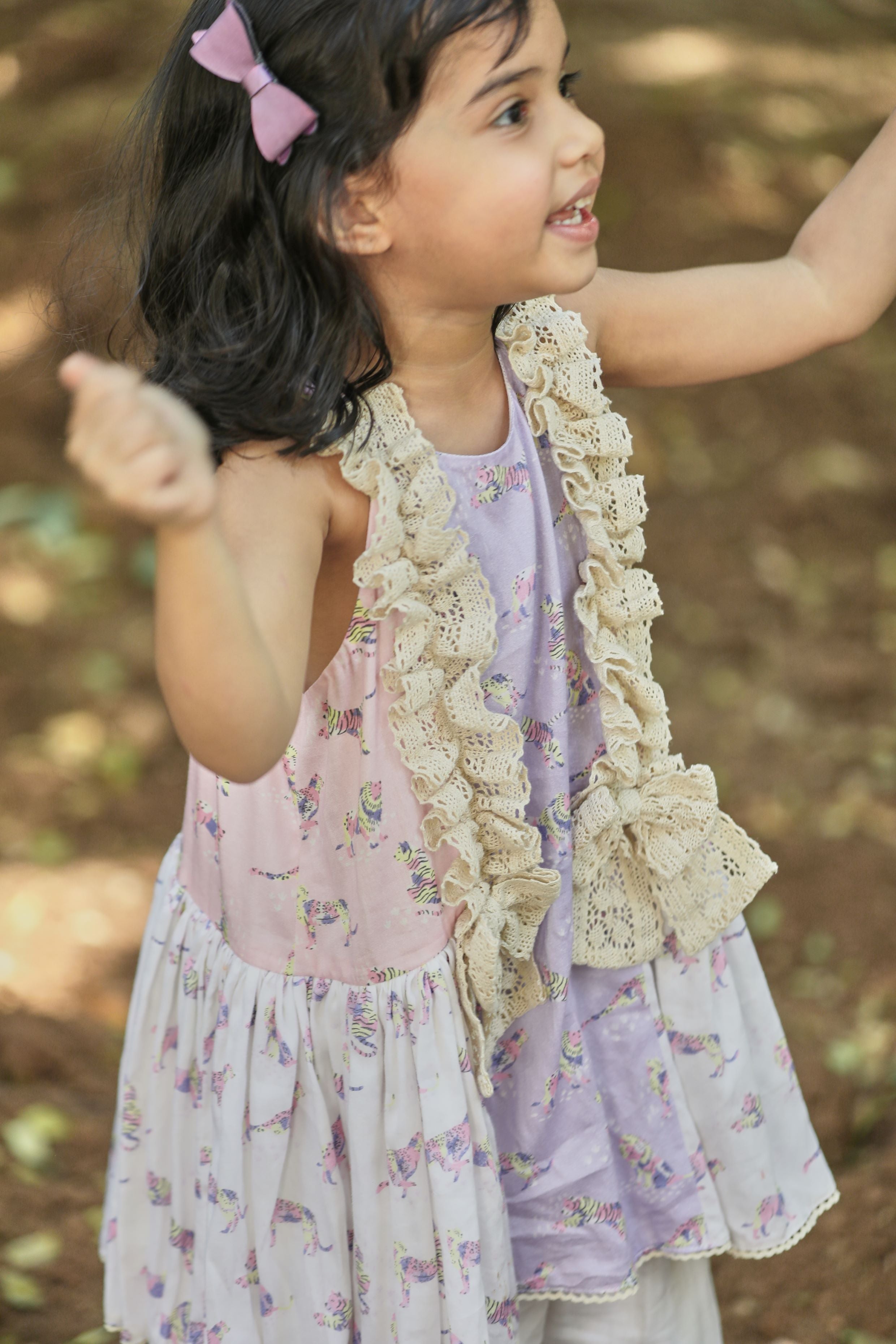 Off-white, pink, lavender animal print A-line kurta with frills & salwar set