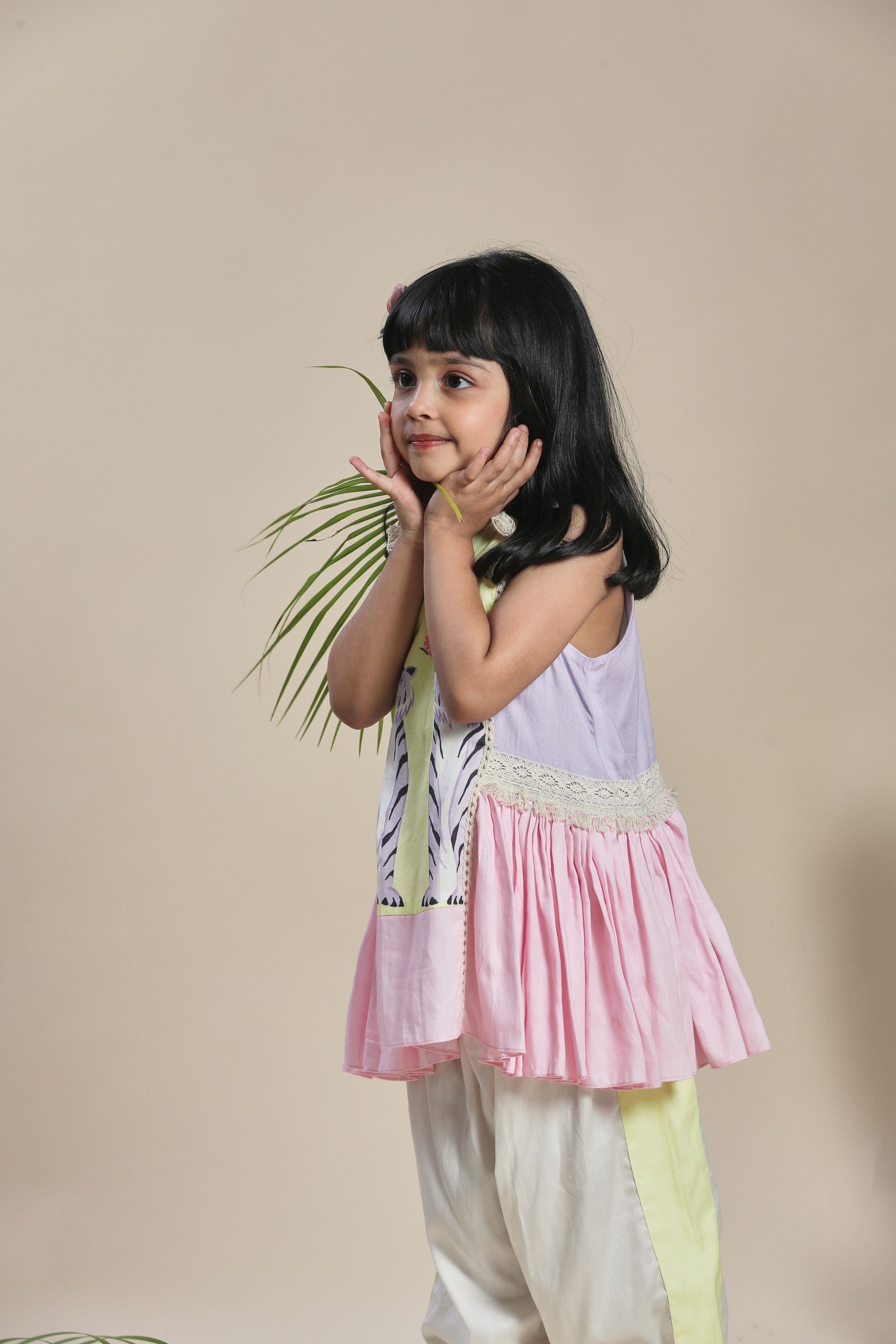 Yellow, lavender and pink A-line kurta with frills and salwar set