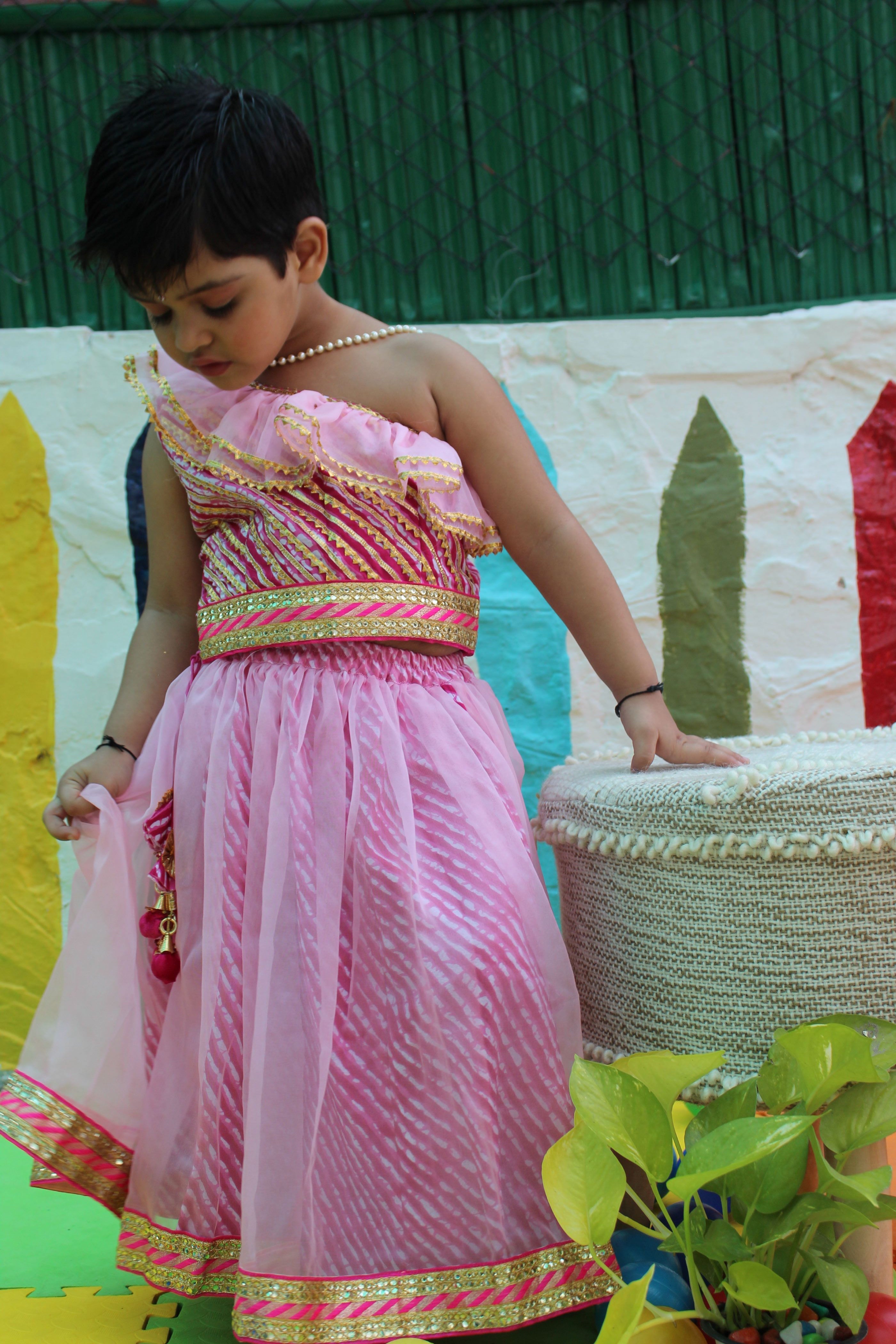 Pink off shoulder leheriya lehenga