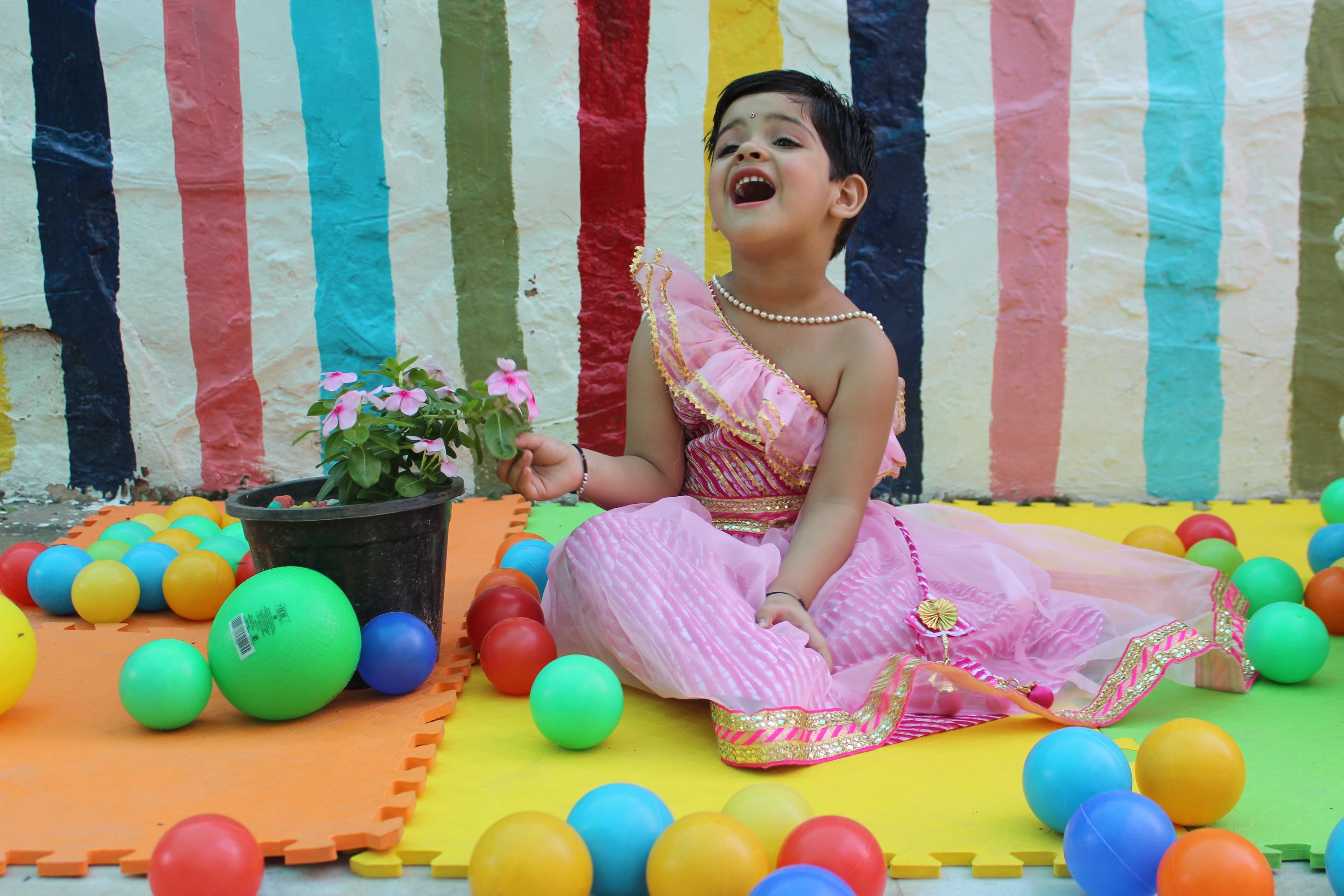 Pink off shoulder leheriya lehenga