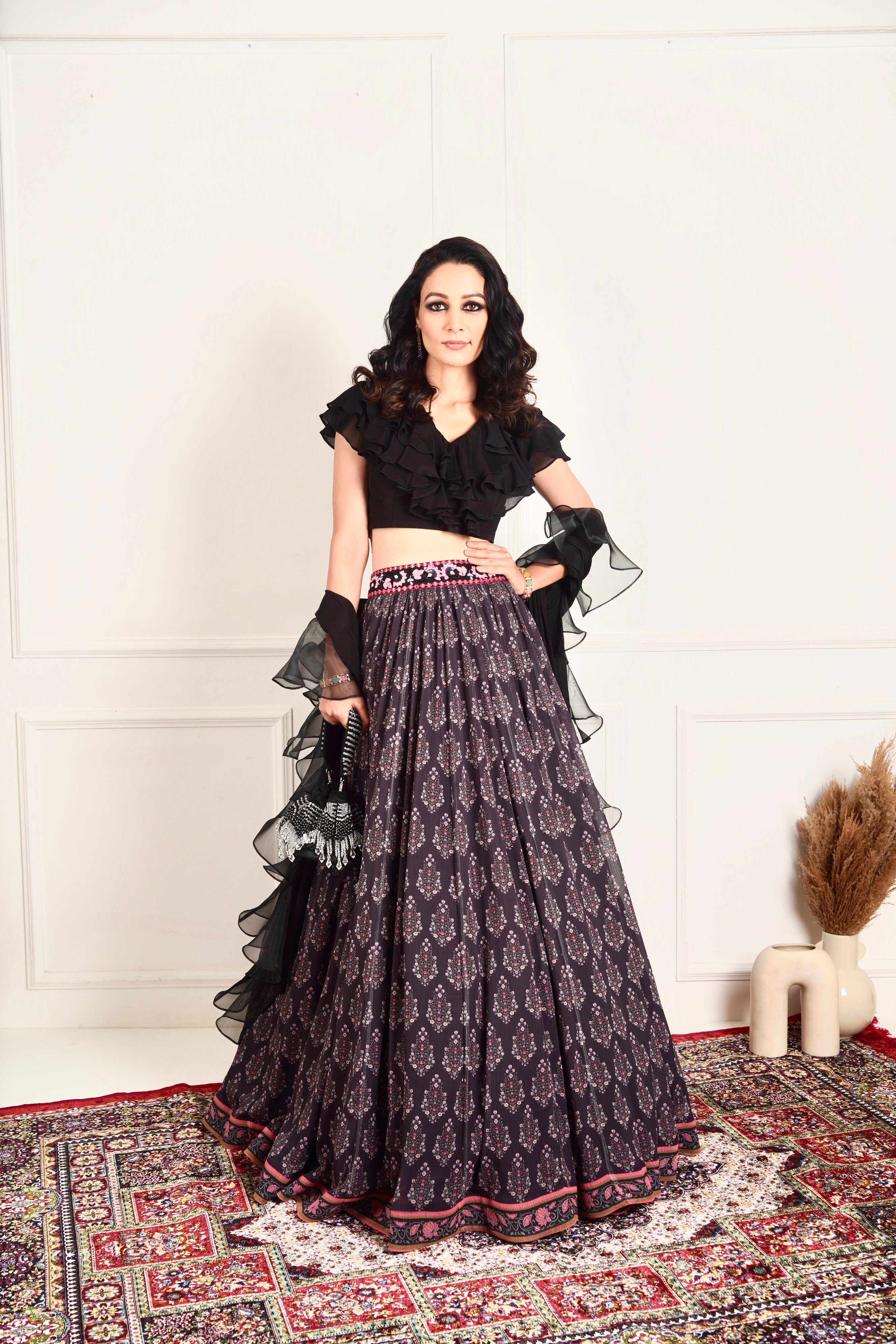 IMAARA black ruffled blouse and printed lehenga